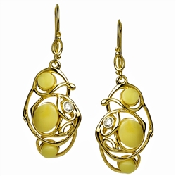 Stylish and unique.  Custard amber in a setting of gold vermeil wire and studded with a cubic zirconia.