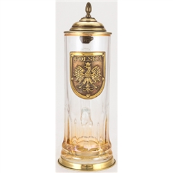 This unique glass stein has an antiqued bronze colored metal lid, thumblift, and base. The base of the glass features a permanent amber spray color. The center of the glass stein is decorated with an antiqued bronze colored medallion that reads POLSKA and