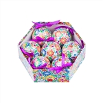 Folk art is the perfect souvenir from Poland. This ornament set is inspired by the flower designs of the Opole region of Silesia in Poland. Lightweight, unbreakable plastic with a decorative Opole floral pattern. Each ornament comes with a purple ribbon