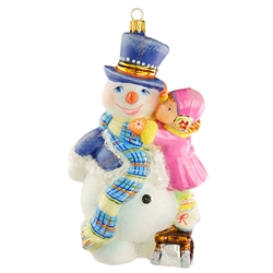 This beautiful ornament of a snowman getting the final touches on his dress up is just precious. Highly detailed. Size approx. 6.5" x 3.5" x 2.5". Made In Poland.