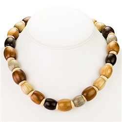 Beautiful handmade hazelnut wood necklace. The hazelnut wood is very light and is nicely polished.  Made In Poland.