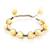 This fine macrame bracelet is made with 10 custard colored amber spheres. This bracelet includes grey cord and a slide clasp to fit most wrists.