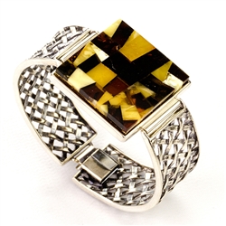 Fits wrists size 2,25" x 1.75". Amber mosaic size is 1.25" x 1.25". Set in sterling silver.  Weight 36.6g.