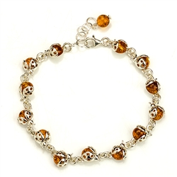 Darling trail of sterling silver and amber ladybugs.  Adjustable from 7" to 8.5"