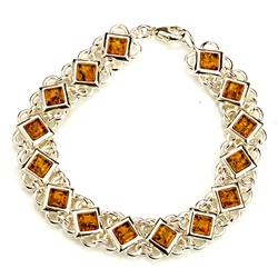 15 square amber beads each set in a sparkling sterling silver frame. 7.5" long.