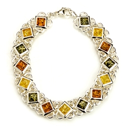15 square amber beads each set in a sparkling sterling silver frame. 7.5" long.
