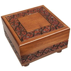 Looks like a beautifully finished and detailed wooden box from Poland (which it is), but there's more than meets the eye! This box won't open if you don't know the trick. Rotating feet unlock the box.  Interior has a red felt lined bottom.