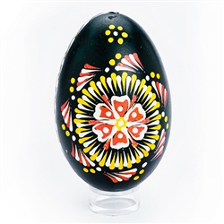 This beautifully designed goose egg is colored using the drop pull method and comes from the Bialystok region of northeast Poland. Eggs are blown and can last for generations. Goose eggs are stronger and larger than chicken eggs which makes them especiall