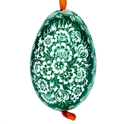 This beautifully designed goose egg is dyed one color and the design scratched into the egg using a sharp knife. The technique is called "skrobanki" in Polish. The eggs have been emptied and strung through with ribbon for hanging. No two eggs are exactly