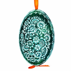 This beautifully designed goose egg is dyed one color and the design scratched into the egg using a sharp knife. The technique is called "skrobanki" in Polish. The eggs have been emptied and strung through with ribbon for hanging. No two eggs are exactly