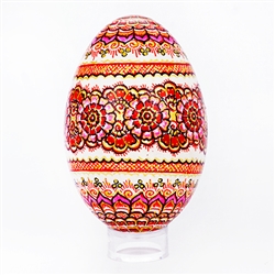 This beautifully designed goose egg is hand painted by master folk artist Krystyna Szkilnik from Opole, Poland. The painting is done in the traditional style from Opole. Eggs are blown and can last for generations. Goose eggs are stronger and larger than