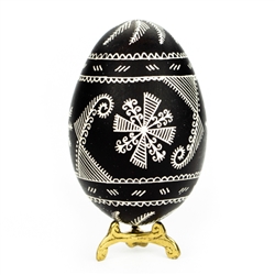 This beautifully designed goose egg is colored using the drop pull method and comes from the Bialystok region of northeast Poland. Eggs are blown and can last for generations. Goose eggs are stronger and larger than chicken eggs which makes them especiall