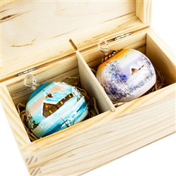 Hand painted glass ornaments featuring Polish country scenes in a deluxe painted wooden box. Hand made so no two ornaments or boxes are exactly the same. Ornaments are approx 2.25" in diameter.