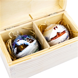 Hand painted glass ornaments featuring Polish country scenes in a deluxe painted wooden box. Hand made so no two ornaments or boxes are exactly the same. Ornaments are approx 2.25" in diameter.