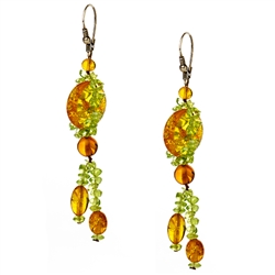 Bozena Przytocka is a designer of artistic amber jewelry based in Gdansk, Poland. Here is a beautiful example of her ability to blend amber and peridot to create a stunning set of earrings.