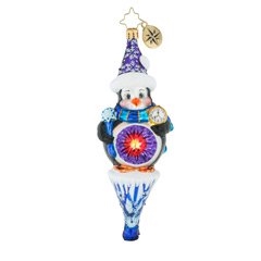 This pleasant little penguin is delightfully pleased standing atop his beautiful ice cycle. Holding a snowflake scepter, he watches the clock most diligently. Is it Christmas yet?