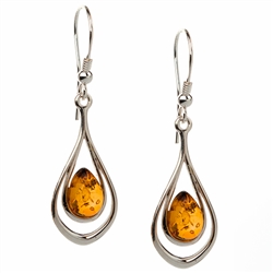 Honey amber ovals suspended in two silver rings.  Size approx 1.75" x .5".