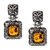 Gorgeous Baltic Amber square stud earrings surrounded with a ring of antique style sterling silver. Size approx .75 x .4".