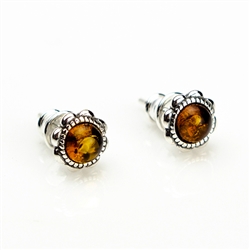 Baltic Amber stud earrings with sterling silver detail.  Size approx .3" diameter.