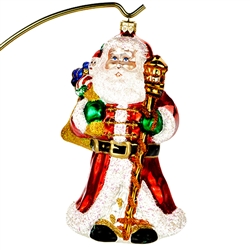 This beautiful ornament of Santa getting ready to deliver gifts is just precious. Highly detailed. Size approx. 6.5" x 3.5" x 3". 
This is a limited edition ornament issued in 2014, number 565 of 2500. &#8203;
&#8203;Made In Poland.