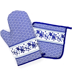 Colorful set of decorative mitt and holder set featuring a traditional Polish stoneware design. 100% polyester. These mitts are more decorative than useful as they do not have effective insulating material. Decorative only - not intended to handle heat.