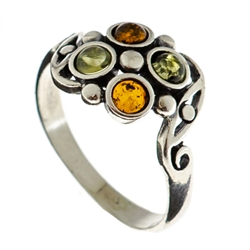 Petite artistic four stone amber and silver ring.