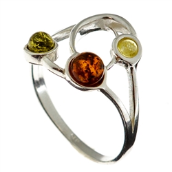 Petite artistic three stone amber ring.