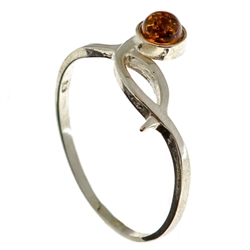Petite size honey oval amber set in sterling silver.
