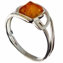 Petite size honey amber set in sterling silver.
