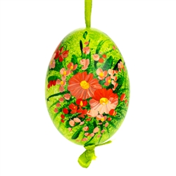 This beautiful hand painted duck egg comes ready to hang. The eggs have been emptied and strung through with ribbon for hanging. No two eggs are exactly alike and ribbon colors vary as well.