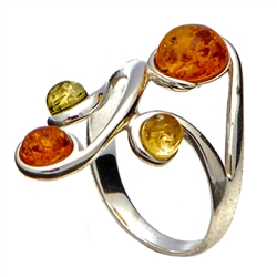 Large artistic four stone amber ring set in sterling silver. Size approx 1" x .75".