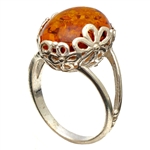 Amber Ring Wrapped in Sterling Silver Flowers