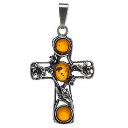 Elegant honey-amber set in a sterling silver cross pendant. Size approx 1.75" x 1".