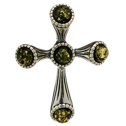 Elegant green amber set in a sterling silver cross pendant. Size approx 1" x .6".