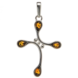 Elegant honey-amber set in a sterling silver pendant. Size approx 1.5" x .75".