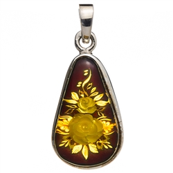 Beautiful tear drop shaped sterling silver amber cameo pendant. The cameo is hand carved from the back of the pendant. Nicely detailed. Size is approx 1.5" x .75".