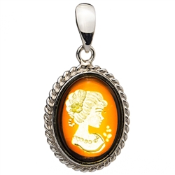 Beautiful rectangular shaped sterling silver amber cameo pendant. The cameo is hand carved from the back of the pendant. Nicely detailed. Size is approx 1.4" x .75".