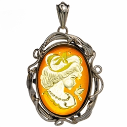 Beautiful oval shaped sterling silver amber cameo pendant. The cameo is hand carved from the back of the pendant. Nicely detailed. Size is approx 1.75" x 1.2".