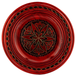 Hand Made in Southern Poland Polish wooden plates are made from Linden wood in the mountain region of southern Poland called Podhale. The plates are cut and shaped on a lathe by hand. The floral designs are burned into the wood before staining and varnish