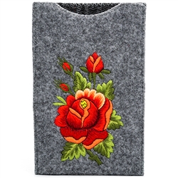 Soft grey felt sewn case with hand embroidered Lowicz folk flowers on one side. Beautiful and functional. Floral Designs Vary
Designed to fit large IPhones. 
Exterior Size - 4" x 7" - Interior size 3.75" x 6.5"
