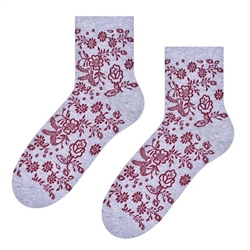 Folk is in fashion and these beautiful Polish hosiery featuring a traditional floral design on a light grey background. Made in Lowicz, Poland.