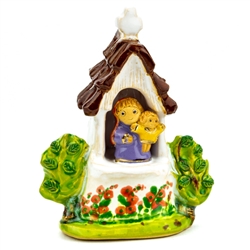 The Polish countryside is home to numerous wayside religious shrines.
Here is our artist's delightful rendition of one dedicated to Mary and Child. Hand made and painted by Polish folk artists Anna and Rajmund Kicman.