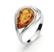 Honey colored amber "Teardrop" set in sterling silver. Size approx. .5" x .75".