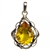 Light honey color amber cabochon set in an artistic sterling silver frame.  Size is approx 2" x 1.25".