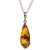 Sterling Silver with antique detail highlighting a beautiful honey amber cabochon.  Amber cabochon size is 1" x .5".