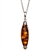 Sterling Silver with antique detail highlighting a beautiful honey amber cabochon.  Amber cabochon size is 1.25 " x .5".