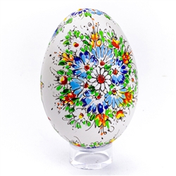 This beautifully designed goose egg is hand painted by master folk artist Alina Wypchlo from Opole, Poland. Her colors are strong and bright. Look carefully and you will find humorous folk elements of nature incorporated into her designs (i.e. a cricket