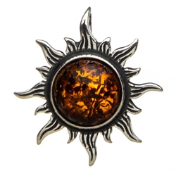 Sterling silver sun framing a beautiful honey amber center.