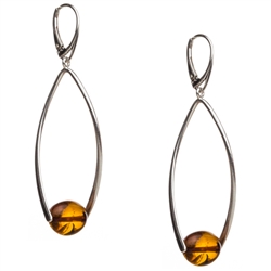 Honey amber suspended in a stylish Sterling Silver twist. Size is approx 2.5" x .75".