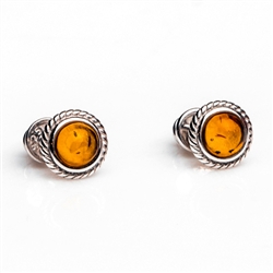 Gorgeous Baltic Amber stud earrings surrounded with a ring of sterling silver.